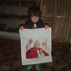 это портрет папы римского вышт на заказ.А держит его мой младший сынуля